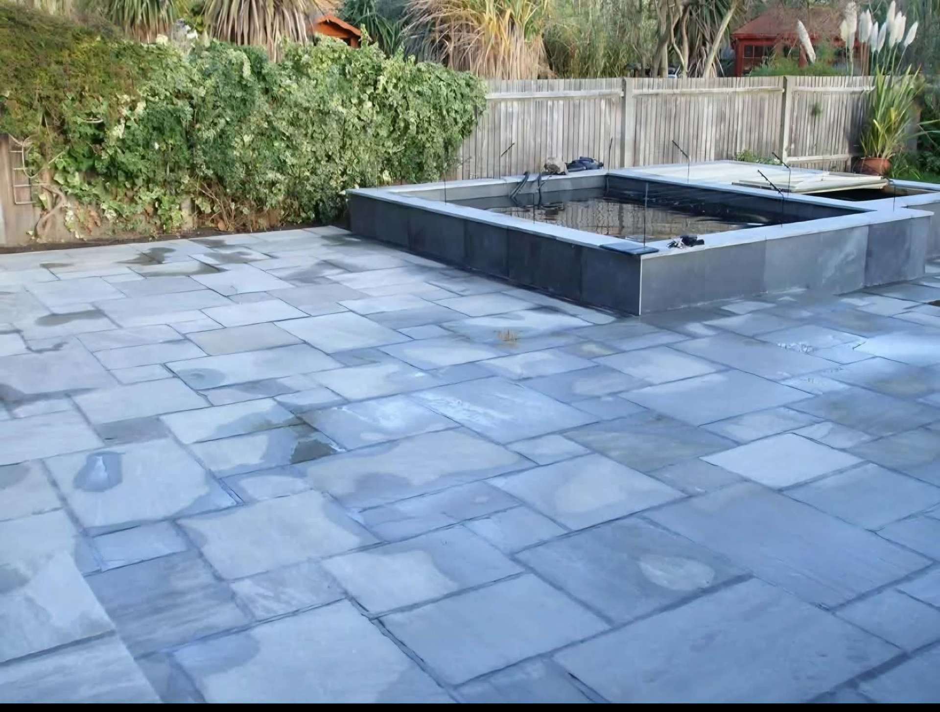 Slate paving & raised pond